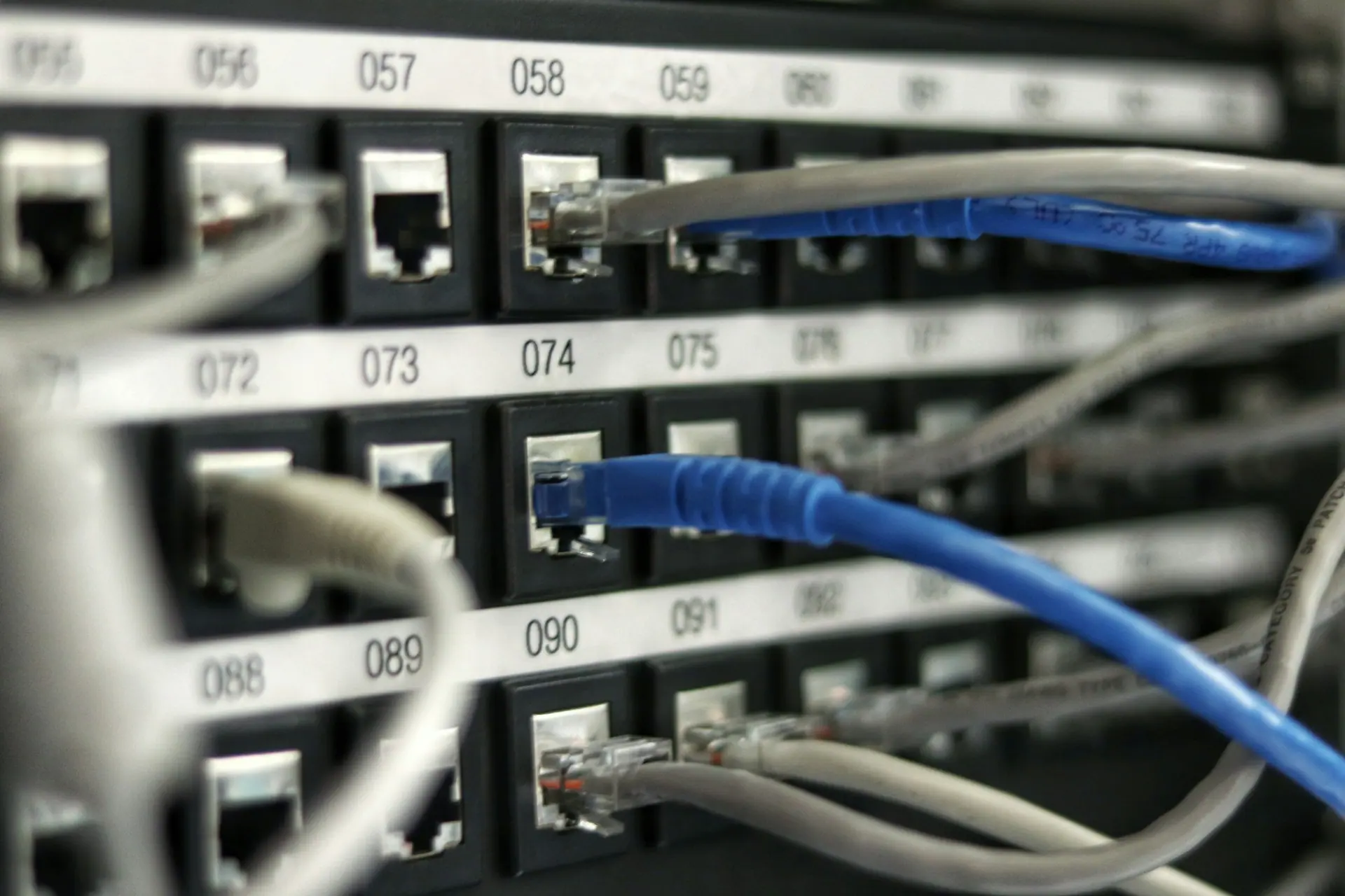 Network infrastructure cabling and switching equipment in a business comms area